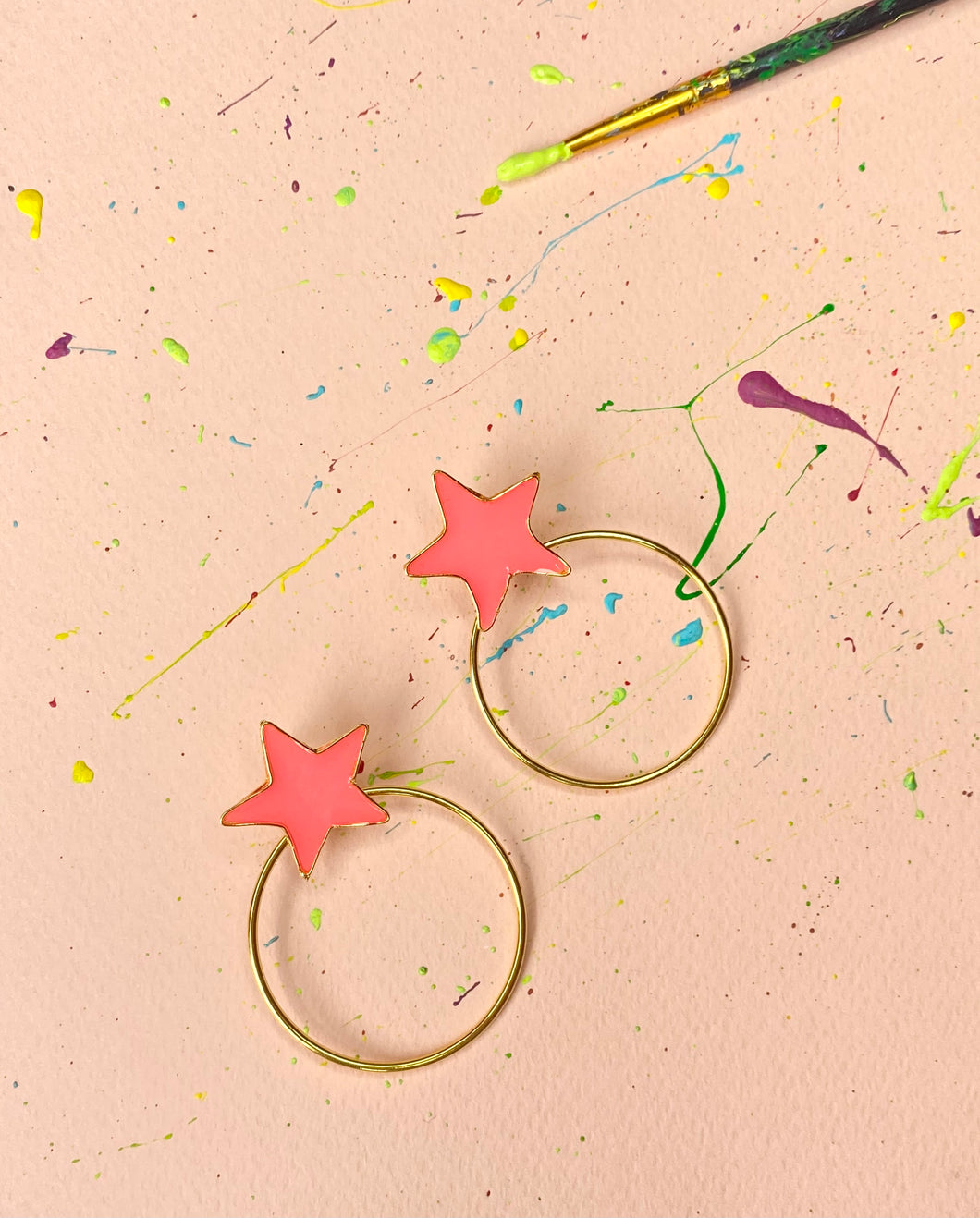 ARETES ESTRELLAS NARANJAS - DOBLE FUNCIÓN